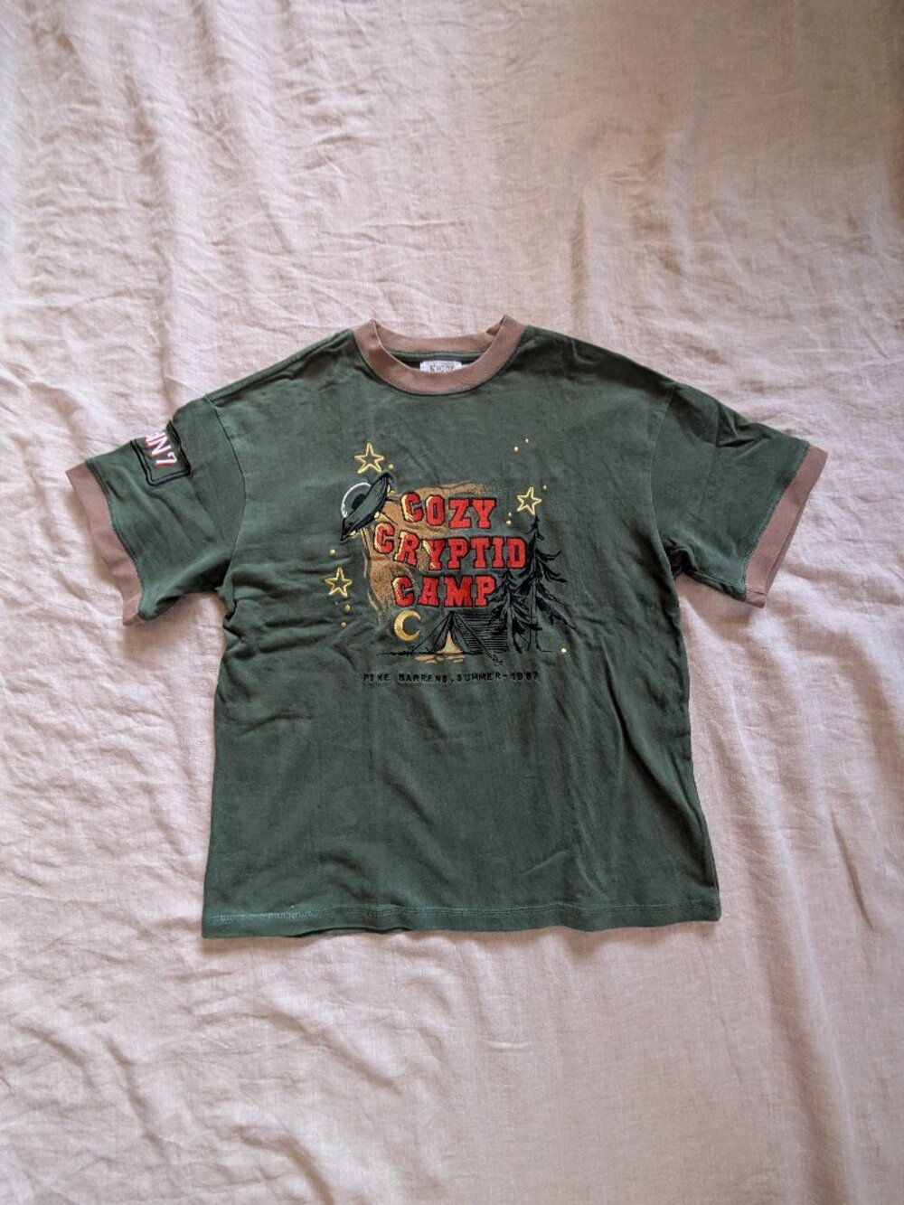 Knock Thrice Cozy Cryptid Camp Ringer Tee